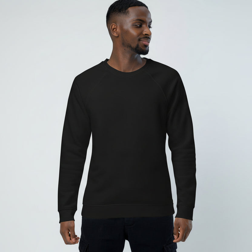 Man wearing a black sweatshirt against a plain background