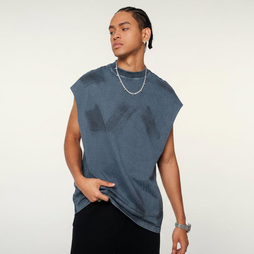 Person wearing a blue sleeveless denim top on a white background