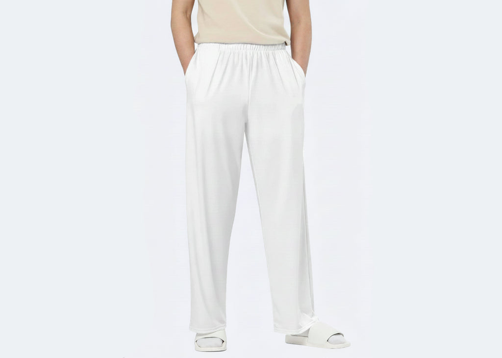 Person wearing white pants on a white background